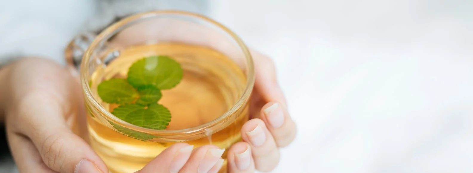 Fresh herbal tea blend featuring ethically sourced ingredients, showcasing the quality of our Australian organic wellness brand.